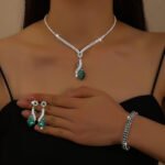 Women Simulated Emerald Heart CZ 4Pcs Jewelry Set, V Necklace Drop Earring Tennis Bracelet Ring Matching Kit